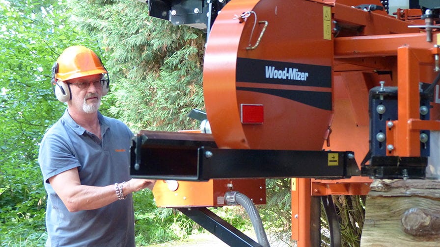 Dave Biggs operates Wood-Mizer sawmill